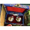 Image 6 : 3 boxes of collectibles including chime balls, brass ring case, doillies, tins, bag full of military