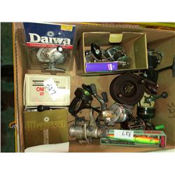 Box full of fishing reels, some unused (great value)