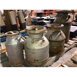 4 creamer cans of various size
