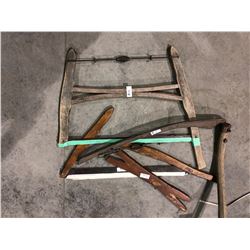 Various old tools, saw, scythe