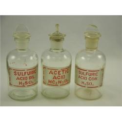 Three Pyrex chemical bottles with stoppers, 6½"H