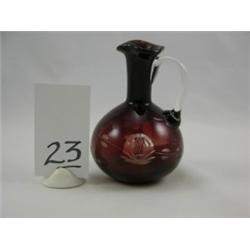 Ruby red and clear pitcher with cut rose, approximately 5½"H