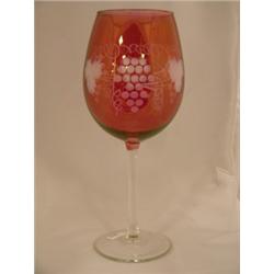 Cranberry and clear tall wine glass with etched grape pattern 9"H