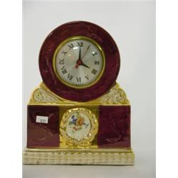 Burgundy porcelain clock, hand decorated with gold, 9¾"H