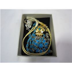 SMALL WHITE BOX WITH BLUE BEADED NECKLACE AND SILVER RING WITH GOLD TONE NECKLACE