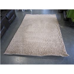 60" BY 90" TAN SHAG AREA CARPET