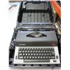 OLYMPIA BLACK AND WHITE TYPEWRITTER IN BLACK CASE