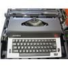 Image 2 : OLYMPIA BLACK AND WHITE TYPEWRITTER IN BLACK CASE