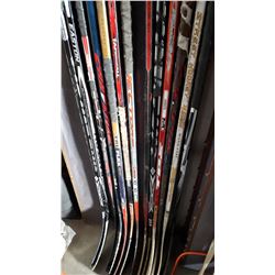 LOT OF LEFT HANDED HOCKEY STICKS SOME ARE ONE PIECE OTHERS INTERCHAGABLE BLADE