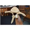 Image 1 : Carved whale vertebrae depicting twin faces and outspread arms, 15" in height and 27" wide, no signa