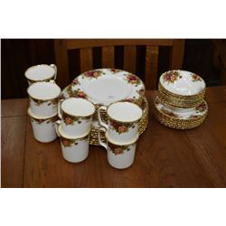 Royal Albert Old Country Roses china dinnerware including eight each of dinner, lunch and bread plat