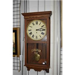 Antique Arthur Pequegnant wall clock in oak and glass case, original "Canadian Time" silk screen, wi