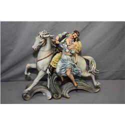 An Italian made Borsato porcelain figurine of a romance cover style couple 12 1/2  in height