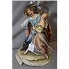 Image 1 : An Italian made Borsato porcelain figure of a Zoro type character wooing a young woman, 13" in heigh