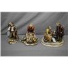 Image 1 : Three Italian made Borsato porcelain figures including elderly couple with tea table, lady peeling p