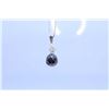 Image 1 : Ladies 14kt white gold and diamond pendant set with one .20ct brilliant white diamond and a 4.20ct b