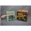 Image 1 : Vintage Japanese tin toy laundry with working friction motor, original box and in near mint conditio