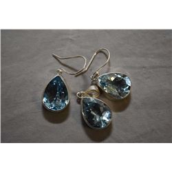 Sterling silver and blue topaz gemstone earrings with matching pendant