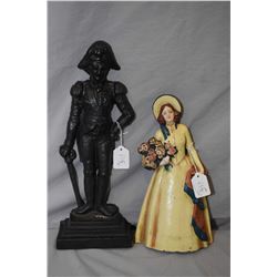 Two cast metal doorstops including Napoleon figure 15" and a young girl with flower basket