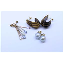 Three pairs of gold earrings including pearl, freshwater pearl etc,