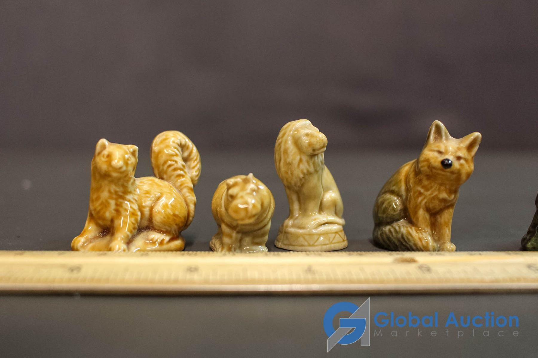 (7) Red Rose Tea Figurines