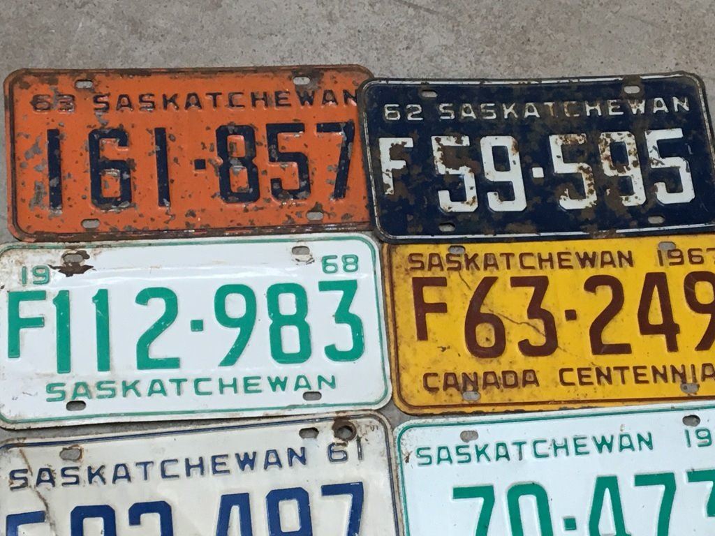 LOT OF 8 SASKATCHEWAN LICENSE PLATES *VINTAGE*