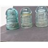 Image 2 : 4 4 GLASS INSULATORS (DOMINION) *1 CLEAR, 3 BLUE* (GLASS IMPERFECTIONS)