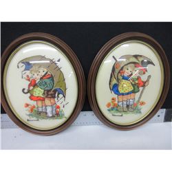 2 Needlepoint in oval bubbled curved glass frames