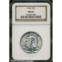 1944 50C MS66 NGC. Just a faint hint of color occu 1944 50C MS66 NGC.