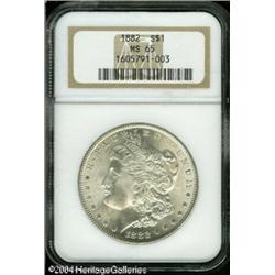 1882 S$1 MS65 NGC. A crescent of deep multicolored 1882 S$1 MS65 NGC.