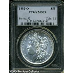 1882-O S$1 MS65 PCGS. A highly lustrous and nearly 1882-O S$1 MS65 PCGS.