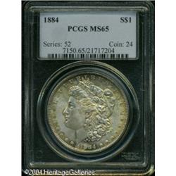 1884 S$1 MS65 PCGS. Lustrous surfaces reveal touch 1884 S$1 MS65 PCGS.