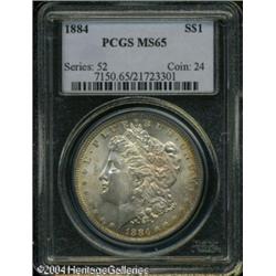 1884 S$1 MS65 PCGS. Whispers of golden-brown and c 1884 S$1 MS65 PCGS.