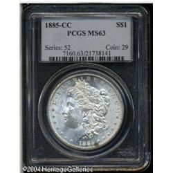 1885-CC S$1 MS63 PCGS. A prominent freckle of gold 1885-CC S$1 MS63 PCGS.