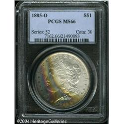 1885-O S$1 MS66 PCGS. Glorious bands of multicolor 1885-O S$1 MS66 PCGS.