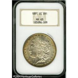 1891-CC S$1 MS63 NGC. Lovely lemon-gold, rose, and 1891-CC S$1 MS63 NGC.