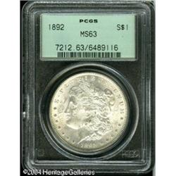 1892 S$1 MS63 PCGS. Faint speckles of olive color 1892 S$1 MS63 PCGS.