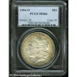 1904-O S$1 MS66 PCGS. Lush fire-red, orange, and s 1904-O S$1 MS66 PCGS.