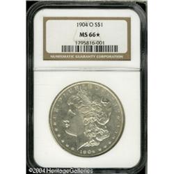 1904-O S$1 MS66 S NGC. A meticulously struck and 1904-O S$1 MS66 S NGC.