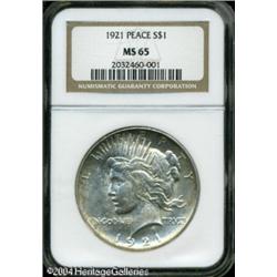 1921 S$1 MS65 NGC. Nicely struck, save for a touch 1921 S$1 MS65 NGC.