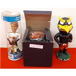 NHL BOBBLEHEAD, BOX OF PUCKS, & VAN RAVEN BOBBLEHEAD