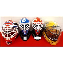 4 MINI NHL GOALIE HELMETS