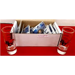2 BC LIONS SHOT GLASSES & BOX OF MINI PUCKS