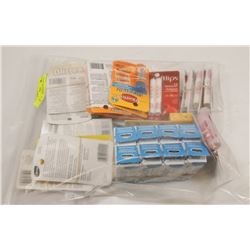 BAG OF ASSORTED ORAL AND LIP CARE PRODUCTS.