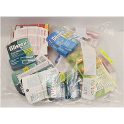 BAG OF ASSORTED ORAL AND LIP CARE PRODUCTS.