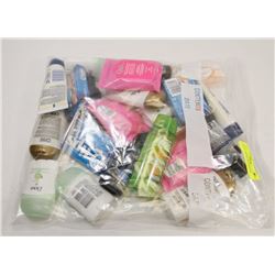 BAG OF TRAVEL SIZE BEAUTY ITEMS.