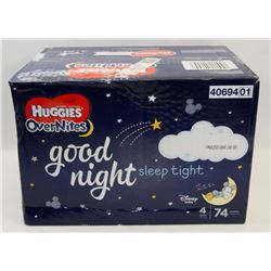 BOX OF HUGGIES OVERNIGHTS. SIZE 4. 74 IN BOX.