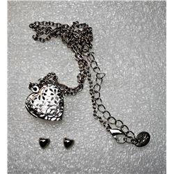 24)  VINTAGE SILVER TONE FILAGREE HEART