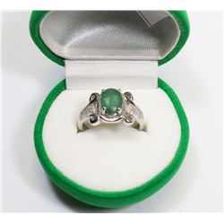 74) STERLING SILVER DIAMOND & GREEN STONE RING