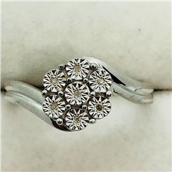 179) STERLING SILVER 7 DIAMOND RING